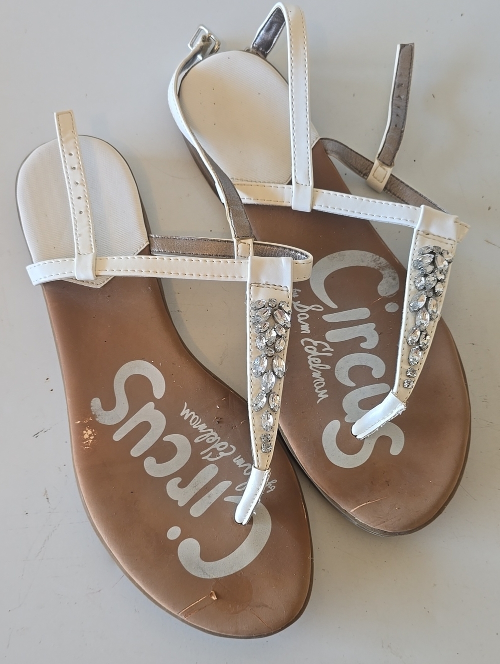Circus by Sam Edelman White Jeweled T-Strap Sandals with Silver Accents